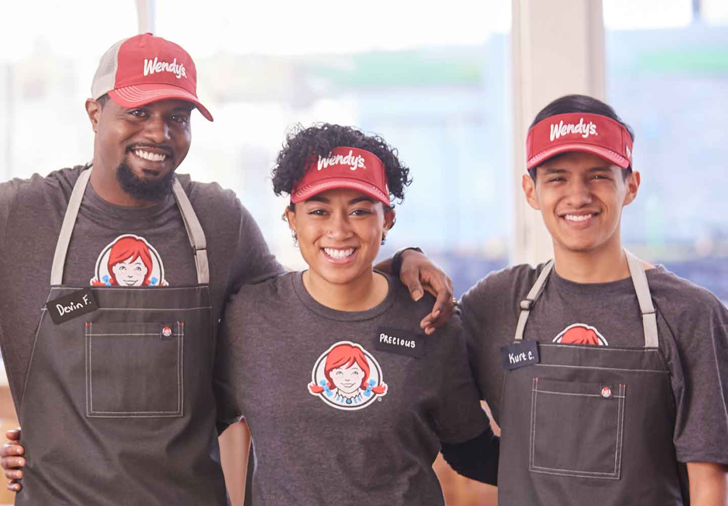 three Wendy's crew members