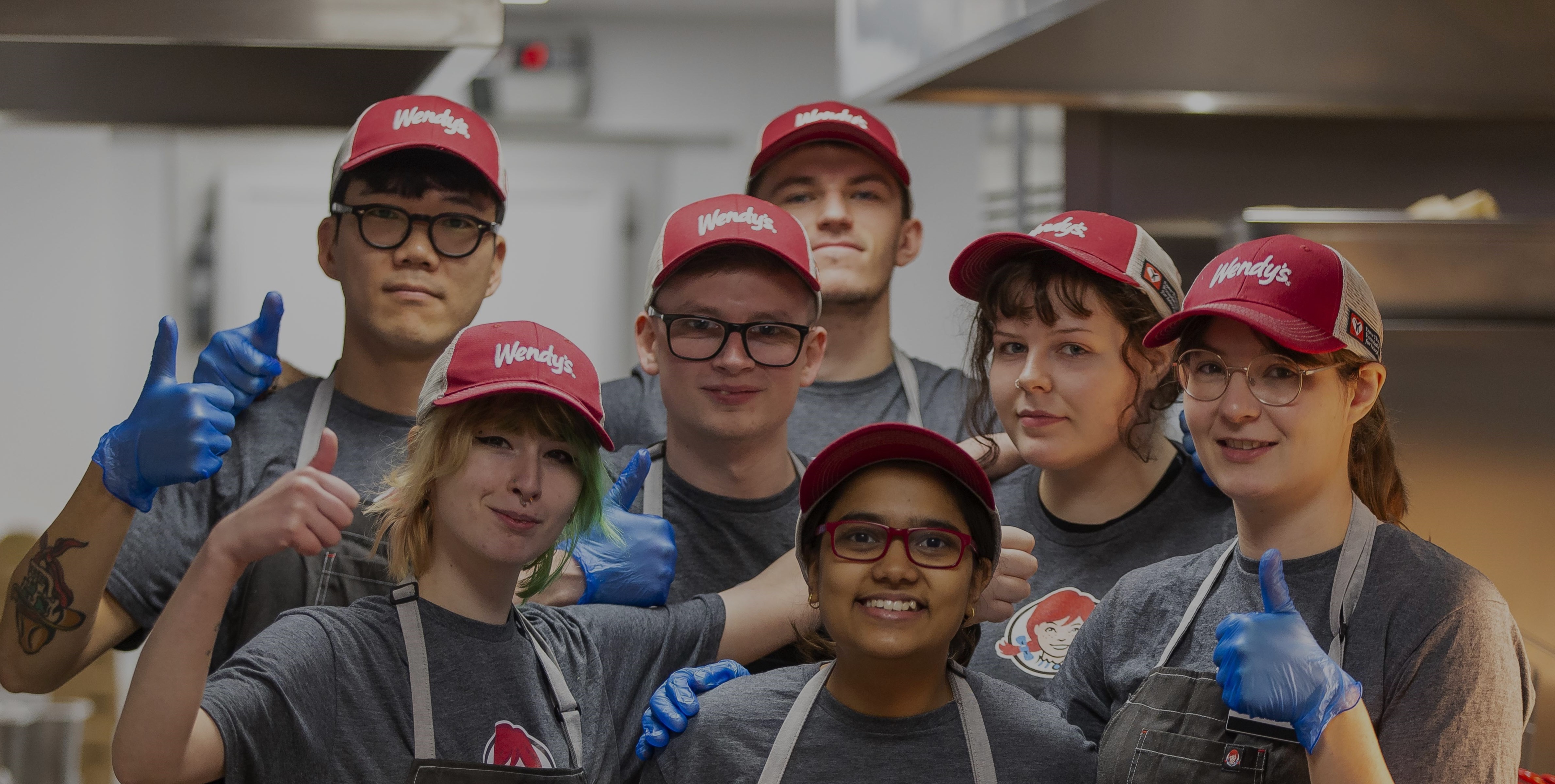 Wendy's Employee smiling at register