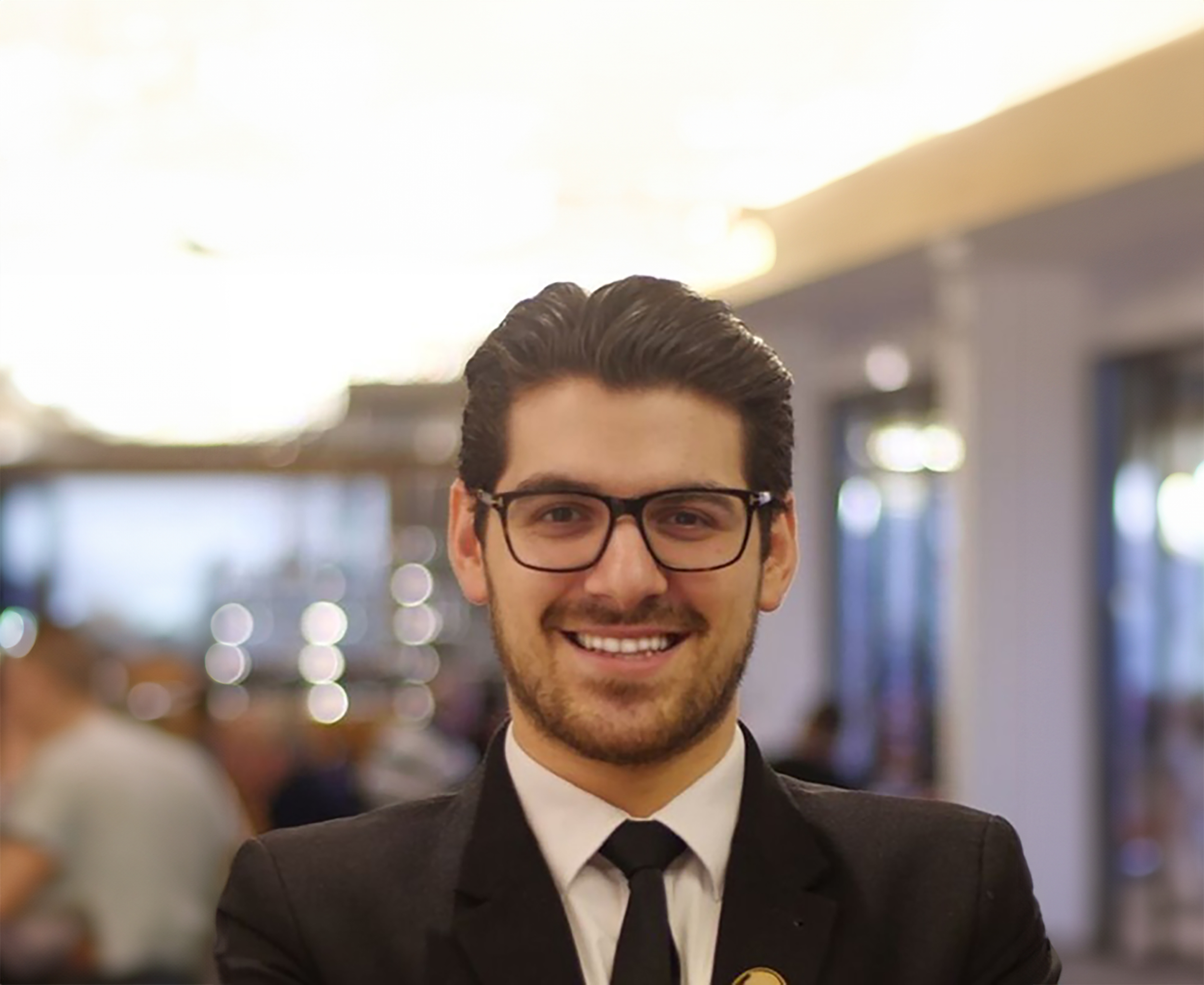 Photo of George in a suit