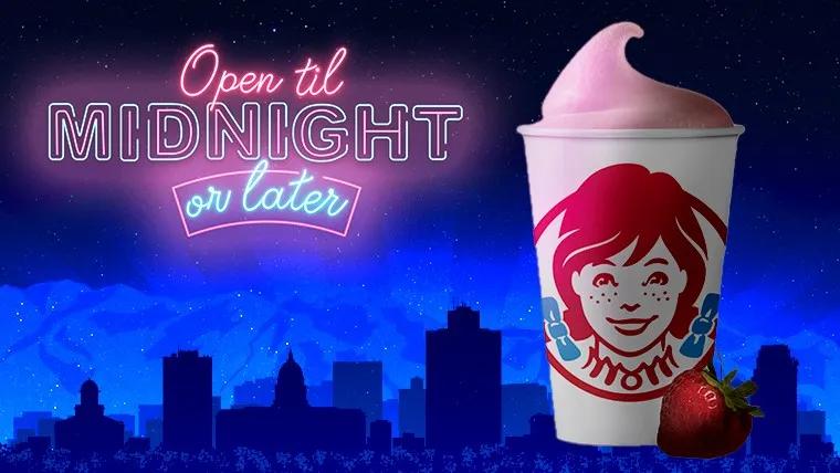Wendy's Strawberry Frosty with "Open 'til Midnight or Later" text 