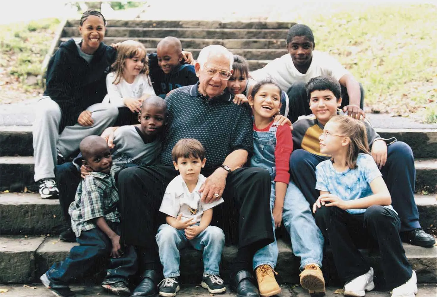 Dave Thomas with group of kids