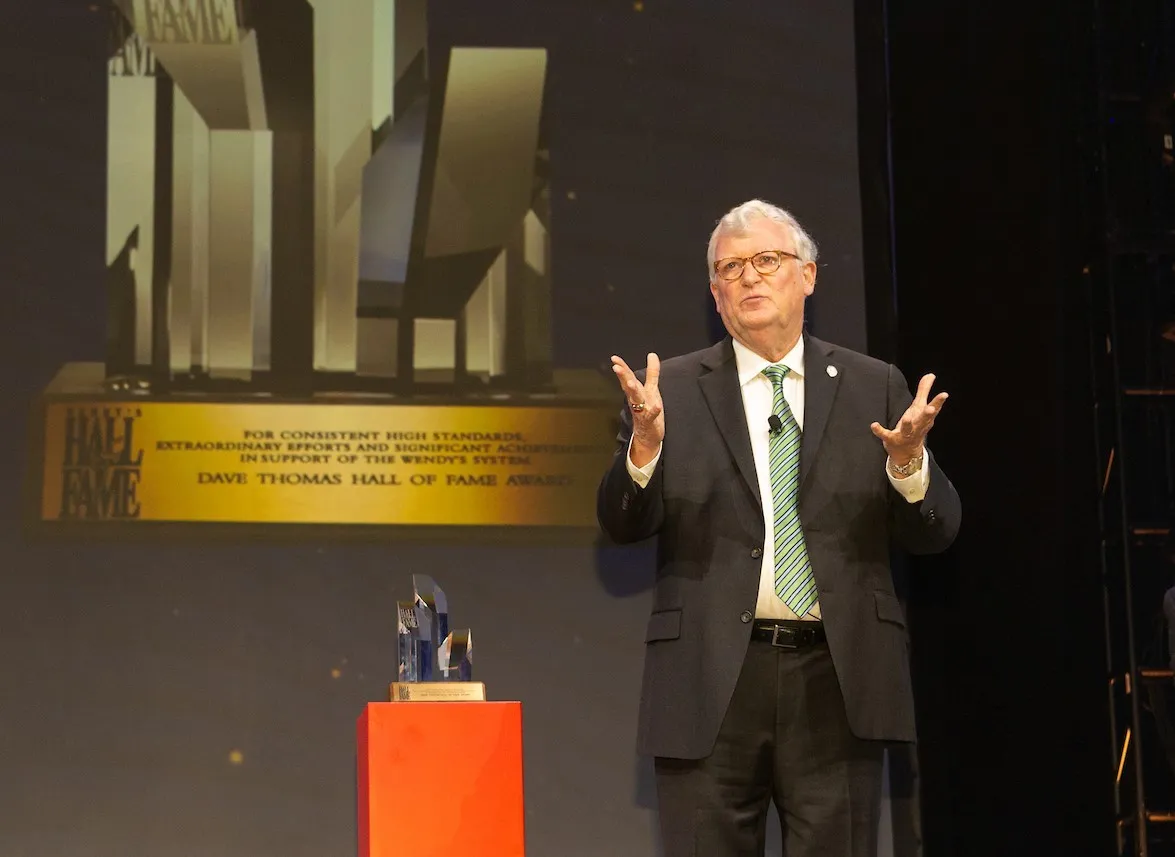 Wendy's franchisee speaks on stage
