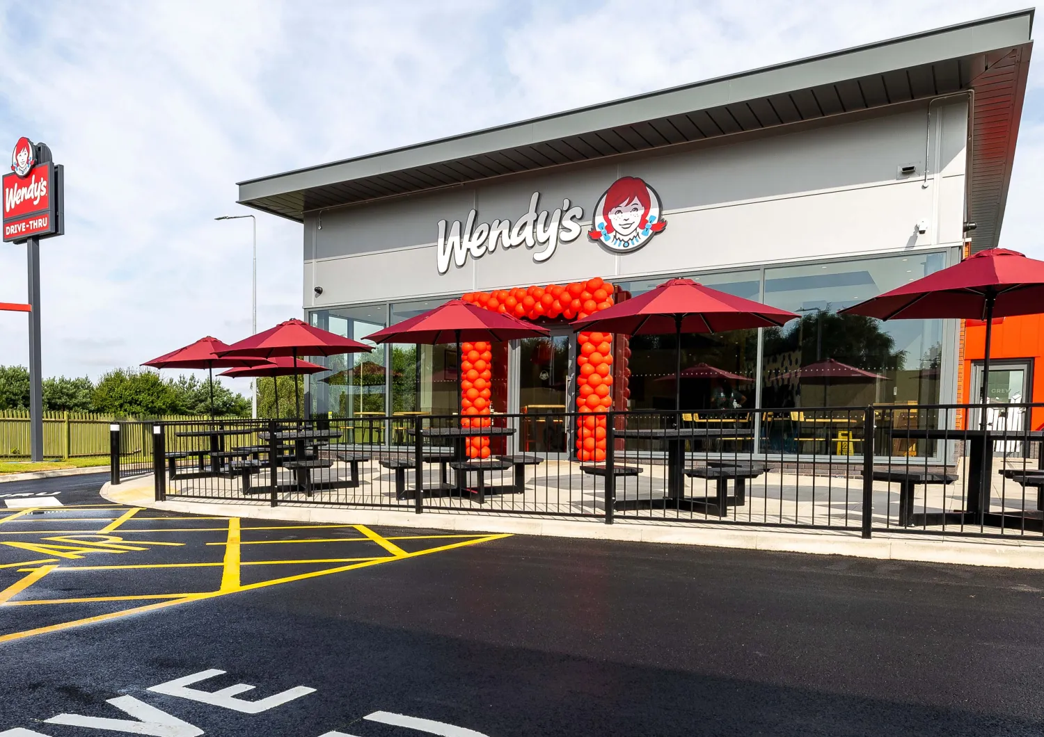 Outside of a Wendy's restaurant and drive-thru in Liverpool, England